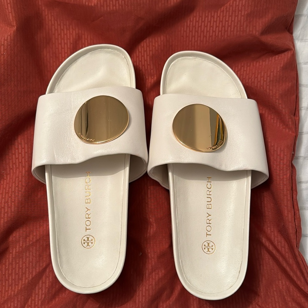Never worn Tory Burch platform slides with gold accent